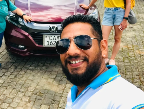 Tour guide Priyan selfie with his car